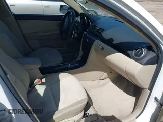 2005 Mazda 3 i with VIN JM1BK12F951340355, listed as a IAAI auction lot 41997844 with 188,991 mi miles and . Bid and sale history available at DreamBid. Image 5.