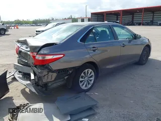 2015 Toyota Camry XLE with VIN 4T1BF1FK1FU069640, listed as a IAAI auction lot 42114496 with 67,702 mi miles and . Bid and sale history available at carsss.com. Image 4.