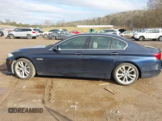 2015 BMW 5 Series 535i with VIN WBA5B1C58FG127959, listed as a IAAI auction lot 41571017 with 122,274 mi miles and . Bid and sale history available at carsss.com. Image 14.