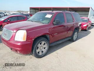2007 GMC Yukon SLE with VIN 1GKFK13077J204048, listed as a IAAI auction lot 42052206 with 273,197 mi miles. Bid and sale history available at carsss.com. Image 2.
