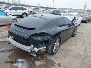2012 Porsche Panamera with VIN WP0AA2A73CL011361, listed as a IAAI auction lot 41564053 with 126,446 mi miles and . Bid and sale history available at DreamBid. Image 4.