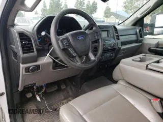 2017 Ford F-250 XL with VIN 1FTBF2A64HEE26438, listed as a Copart auction lot 45762404 with 133,077 mi miles and Salvage title. Bid and sale history available at DreamBid. Image 8.