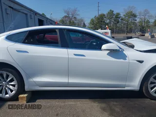 2016 Tesla Model S 90D with VIN 5YJSA1E26GF147327, listed as a IAAI auction lot 42077766 with 89,502 mi miles and . Bid and sale history available at DreamBid. Image 13.