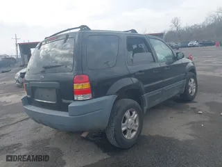 2004 Ford Escape XLT with VIN 1FMCU03114KB25567, listed as a IAAI auction lot 41559575 with 238,685 mi miles. Bid and sale history available at carsss.com. Image 4.