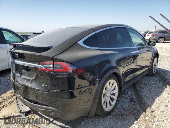 2016 Tesla Model X 70D z VIN 5YJXCBE25GF004035, wystawiony jako Copart lot #43964955 z przebiegiem 127 100 mil mil oraz Szkody całkowita. Historia ofert i sprzedaży dostępna na DreamBid. Obrazek 3.
