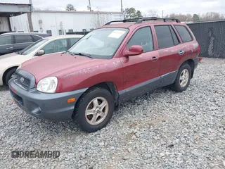 2002 Hyundai Santa Fe GLS with VIN KM8SC73D72U306997, listed as a IAAI auction lot 41519773 with 244,398 mi miles. Bid and sale history available at carsss.com. Image 2.