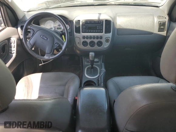 2007 Ford Escape Hybrid with VIN 1FMCU49H87KB61613, listed as a Copart auction lot 58083235 with 129,049 mi miles and Salvage title. Bid and sale history available at DreamBid. Image 8.