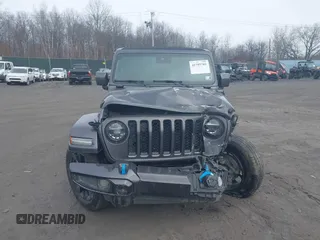 2021 Jeep Wrangler Unlimited Sahara with VIN 1C4JJXP65MW676726, listed as a IAAI auction lot 41795701 with 38,480 mi miles and . Bid and sale history available at DreamBid. Image 12.