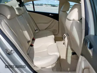2010 Volkswagen Passat Komfort z VIN WVWJK7AN9AE077813, wystawiony jako Copart lot #56409415 z przebiegiem 148 043 mil mil oraz Czysty tytuł • Clean title. Historia ofert i sprzedaży dostępna na DreamBid. Obrazek 10.