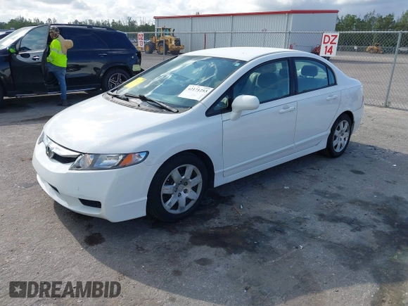 2010 Honda Civic LX with VIN 2HGFA1F54AH533810, listed as a IAAI auction lot 42171253 with 211,551 mi miles and . Bid and sale history available at DreamBid. Image 2.