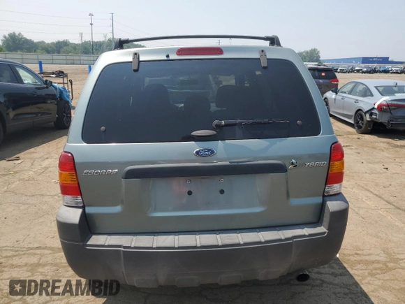 2006 Ford Escape Hybrid z VIN 1FMCU96H86KB36291, wystawiony jako Copart lot #64482105 z przebiegiem 224 253 mil mil oraz Czysty tytuł • Clean title. Historia ofert i sprzedaży dostępna na DreamBid. Obrazek 6.
