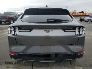2021 Ford Mustang Mach-E Premium z VIN 3FMTK3SUXMMA09053, wystawiony jako Copart lot #48851195 z przebiegiem 89 767 mil mil oraz Szkody całkowita. Historia ofert i sprzedaży dostępna na DreamBid. Obrazek 6.