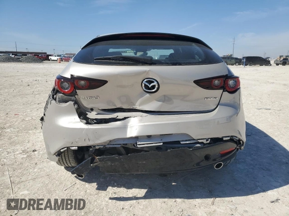 2024 Mazda 3 S Preferred z VIN JM1BPALMXR1718512, wystawiony jako Copart lot #44570995 z przebiegiem 4 332 mil mil oraz Szkoda całkowita • Salvage title. Historia ofert i sprzedaży dostępna na DreamBid. Obrazek 6.