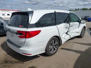 2022 Honda Odyssey Touring with VIN 5FNRL6H84NB062604, listed as a IAAI auction lot 41724006 with 41,351 mi miles and . Bid and sale history available at DreamBid. Image 4.