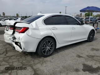 2020 BMW 3 Series 330i xDrive with VIN 3MW5R7J03L8B05948, listed as a Copart auction lot 50885545 with 90,074 mi miles and Salvage title. Bid and sale history available at DreamBid. Image 3.