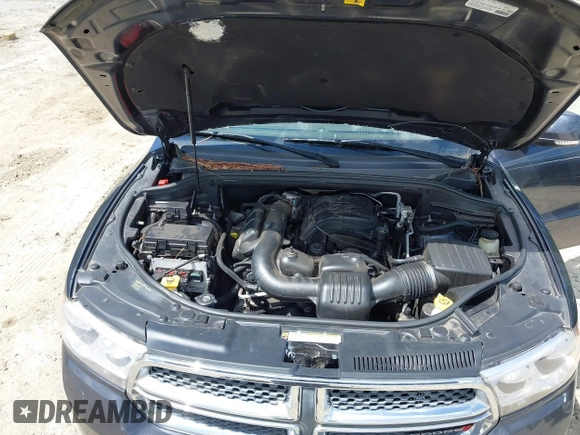2013 Dodge Durango Crew with VIN 1C4RDHDG7DC657898, listed as a IAAI auction lot 42522353 with 234,483 mi miles and . Bid and sale history available at DreamBid. Image 10.