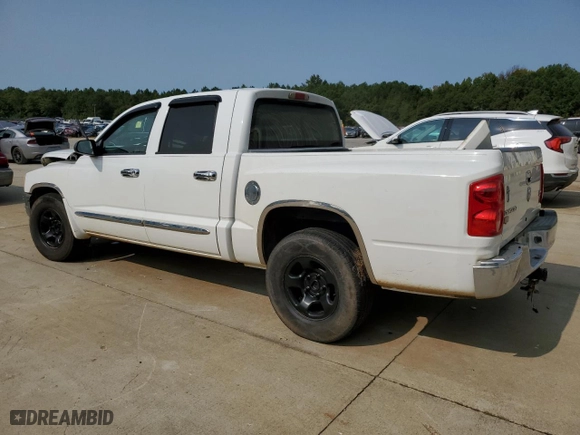 2005 Dodge Dakota Laramie with VIN 1D7HE58N35S224298, listed as a Copart auction lot 70650524 with 179,946 mi miles and Salvage Title. Bid and sale history available at carsss.com. Image 2.