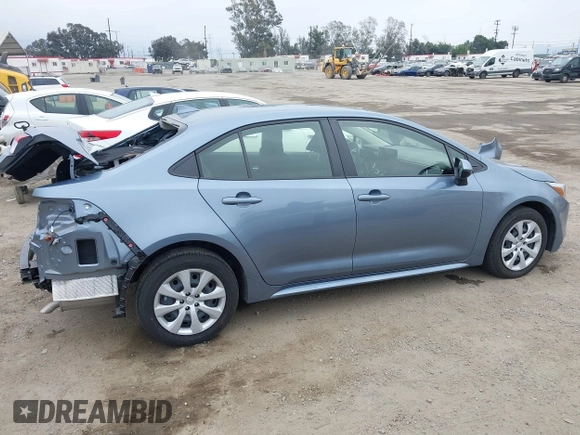 2023 Toyota Corolla Hybrid LE with VIN JTDBCMFE8PJ013271, listed as a IAAI auction lot 42099797 with 14,080 mi miles and . Bid and sale history available at carsss.com. Image 14.