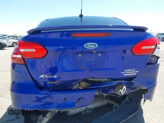 2015 Ford Focus Titanium with VIN 1FADP3J25FL314903, listed as a IAAI auction lot 42053132 with 125,418 mi miles and . Bid and sale history available at carsss.com. Image 17.