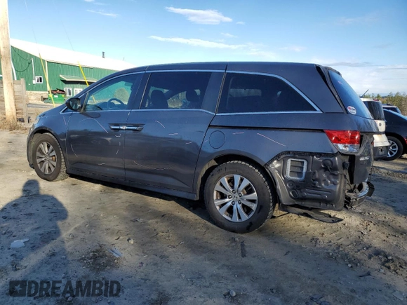 2014 Honda Odyssey EX-L with VIN 5FNRL5H66EB059115, listed as a Copart auction lot 81055334 with 173,410 mi miles and Salvage Title. Bid and sale history available at DreamBid. Image 2.