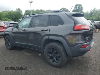 2015 Jeep Cherokee Trailhawk with VIN 1C4PJMBS0FW655167, listed as a Copart auction lot 64597165 with 193,779 mi miles and Clean title. Bid and sale history available at DreamBid. Image 2.