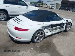 2014 Porsche 911 Carrera S z VIN WP0CB2A97ES154099, wystawiony jako IAAI lot #42264557 z przebiegiem 89 991 mil mil oraz . Historia ofert i sprzedaży dostępna na DreamBid. Obrazek 4.