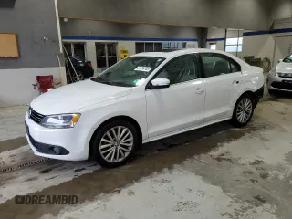 2012 Volkswagen Jetta Sedan SEL w/Sunroof with VIN 3VWLX7AJ6CM470301, listed as a Copart auction lot 51794705 with 191,727 mi miles and Salvage Title. Bid and sale history available at carsss.com. Image 1.