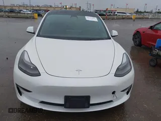 2023 Tesla Model 3 with VIN 5YJ3E1EA8PF578199, listed as a IAAI auction lot 41735465 with 50,823 mi miles and . Bid and sale history available at DreamBid. Image 12.