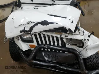 1990 Jeep Wrangler S with VIN 2J4FY19E8LJ541713, listed as a Copart auction lot 60809655 with 134,077 mi miles and Clean title. Bid and sale history available at DreamBid. Image 11.