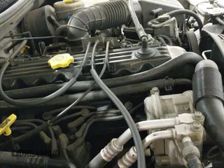 1996 Jeep Grand Cherokee Laredo z VIN 1J4GZ58S5TC293897, wystawiony jako IAAI lot #42435233 z przebiegiem 167 432 mil mil oraz . Historia ofert i sprzedaży dostępna na DreamBid. Obrazek 18.