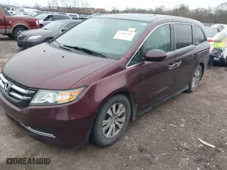 2015 Honda Odyssey EX-L with VIN 5FNRL5H68FB030104, listed as a IAAI auction lot 41684307 with 182,185 mi miles. Bid and sale history available at carsss.com. Image 2.