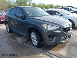 2014 Mazda CX-5 Grand Touring with VIN JM3KE2DY7E0345742, listed as a IAAI auction lot 41864116 with 158,746 mi miles. Bid and sale history available at carsss.com. Image 1.