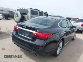 2015 Infiniti Q70 with VIN JN1BY1PP9FM601468, listed as a IAAI auction lot 41745618 with 138,932 mi miles and . Bid and sale history available at DreamBid. Image 4.