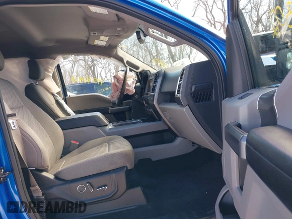 2015 Ford F-150 XLT with VIN 1FTEW1EG1FFA87638, listed as a IAAI auction lot 41597302 with 143,400 mi miles. Bid and sale history available at carsss.com. Image 5.