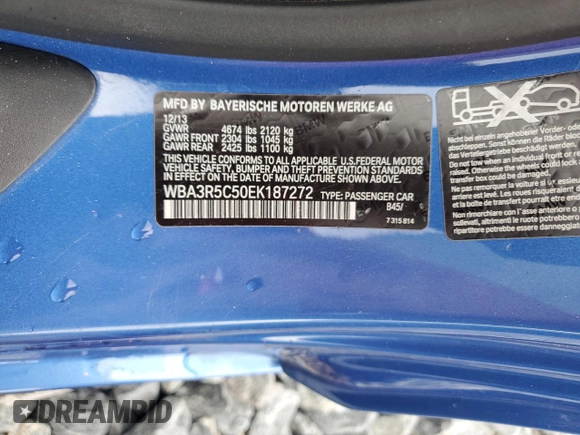 2014 BMW 4 Series 435i xDrive with VIN WBA3R5C50EK187272, listed as a Copart auction lot 56579855 with 129,873 mi miles and Salvage title. Bid and sale history available at DreamBid. Image 12.