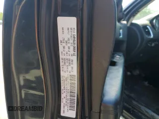 2013 Dodge Durango Crew z VIN 1C4RDHDG3DC700276, wystawiony jako Copart lot #52290215 z przebiegiem 198 243 mil mil oraz Szkody całkowita. Historia ofert i sprzedaży dostępna na DreamBid. Obrazek 14.