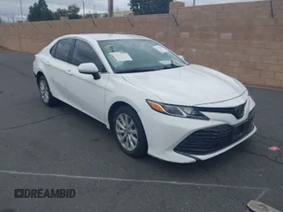 2020 Toyota Camry LE with VIN 4T1C11AK3LU882824, listed as a IAAI auction lot 41765544 with 48,209 mi miles and . Bid and sale history available at carsss.com. Image 1.