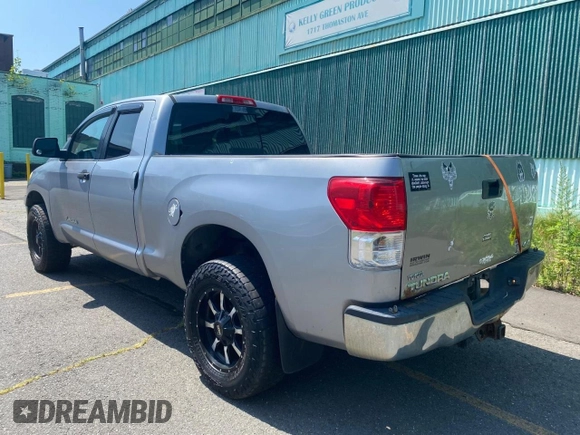 2010 Toyota Tundra with VIN 5TFUM5F11AX01281, listed as a Copart auction lot 66980935 with 308,906 mi miles and Clean title. Bid and sale history available at DreamBid. Image 3.