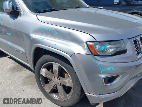 2014 Jeep Grand Cherokee Overland with VIN 1C4RJECG0EC291048, listed as a IAAI auction lot 41883941 with 81,871 mi miles. Bid and sale history available at carsss.com. Image 6.