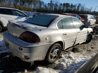 2002 Pontiac Grand Am GT1 with VIN 1G2NV52E52M626348, listed as a Copart auction lot 87703175 with 91,215 mi miles and Salvage Title. Bid and sale history available at carsss.com. Image 3.