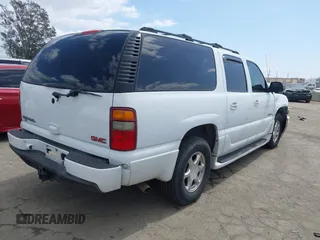 2003 GMC Yukon XL Denali with VIN 1GKFK66UX3J227538, listed as a IAAI auction lot 41915607 with 150,173 mi miles. Bid and sale history available at carsss.com. Image 4.