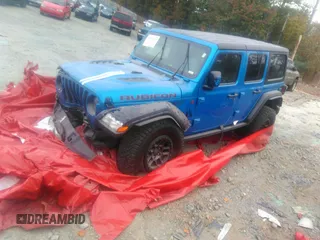 2021 Jeep Wrangler Unlimited Rubicon with VIN 1C4JJXFG3MW833275, listed as a IAAI auction lot 39371948 with 43,428 mi miles. Bid and sale history available at carsss.com. Image 2.