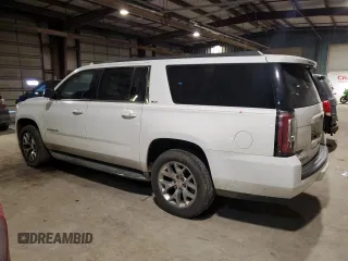 2015 GMC Yukon XL SLT with VIN 1GKS2HKC1FR541866, listed as a Copart auction lot 42756225 with 166,915 mi miles and Salvage Title. Bid and sale history available at carsss.com. Image 2.