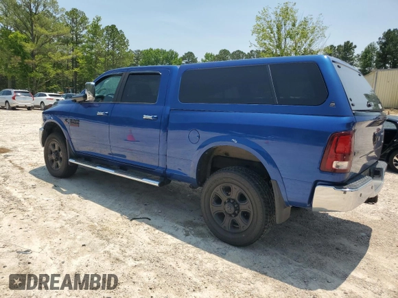 2015 Ram 2500 Laramie with VIN 3C6UR5FL5FG582579, listed as a Copart auction lot 58382715 with 128,605 mi miles and Salvage title. Bid and sale history available at DreamBid. Image 2.