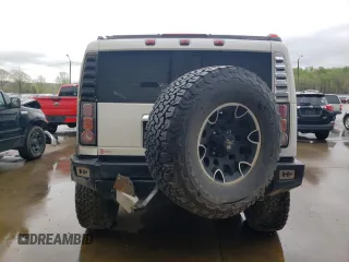 2003 Hummer H2 with VIN 5GRGN23U43H128269, listed as a Copart auction lot 47992444 with 153,360 mi miles and Salvage Title. Bid and sale history available at carsss.com. Image 6.