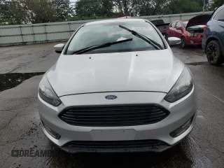 2016 Ford Focus SE with VIN 1FADP3FE5GL233081, listed as a Copart auction lot 65498195 with 89,674 mi miles and Salvage title. Bid and sale history available at DreamBid. Image 5.