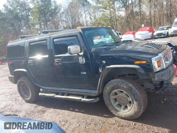 2003 Hummer H2 with VIN 5GRGN23U33H144379, listed as a IAAI auction lot 41452982 with 227,746 mi miles. Bid and sale history available at carsss.com. Image 13.
