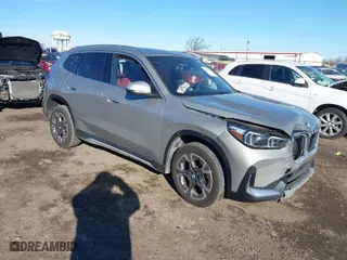 2023 BMW X1 xDrive28i with VIN WBX73EF03P5Y16663, listed as a IAAI auction lot 41284371 with 12,440 mi miles. Bid and sale history available at carsss.com. Image 1.