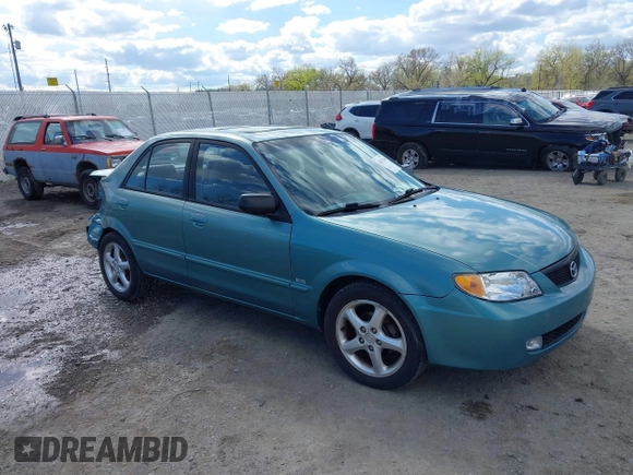 2002 Mazda Protege DX z VIN JM1BJ225721591435, wystawiony jako IAAI lot #42117544 z przebiegiem 191 185 mil mil oraz . Historia ofert i sprzedaży dostępna na DreamBid. Obrazek 1.