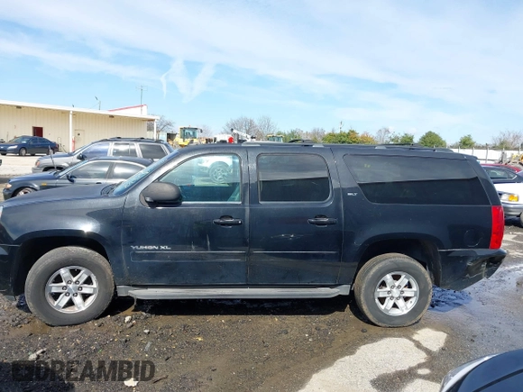 2014 GMC Yukon XL SLT with VIN 1GKS2KE77ER199723, listed as a IAAI auction lot 41555112 with 215,436 mi miles. Bid and sale history available at carsss.com. Image 14.